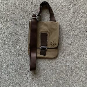 Lacoste crossbody brown canvas bag with magnetic clasp. Used. 10x8